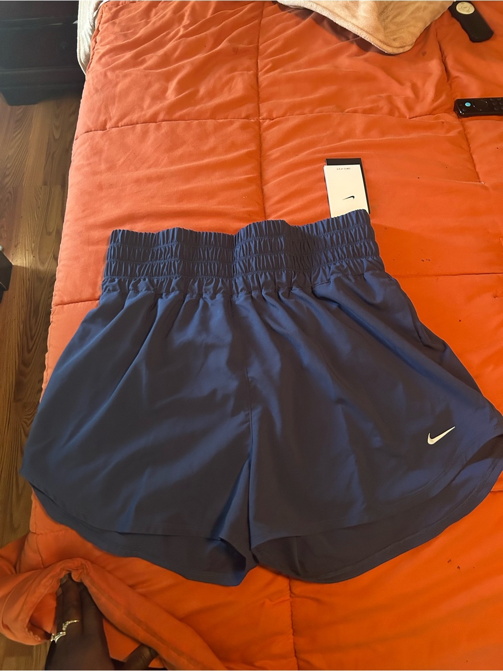 Nike Women's High-Waist Athletic Shorts in Navy Blue with White Swoosh